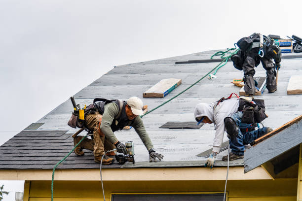 Professional Emergency Roof Repair technician working in Mallory, NY